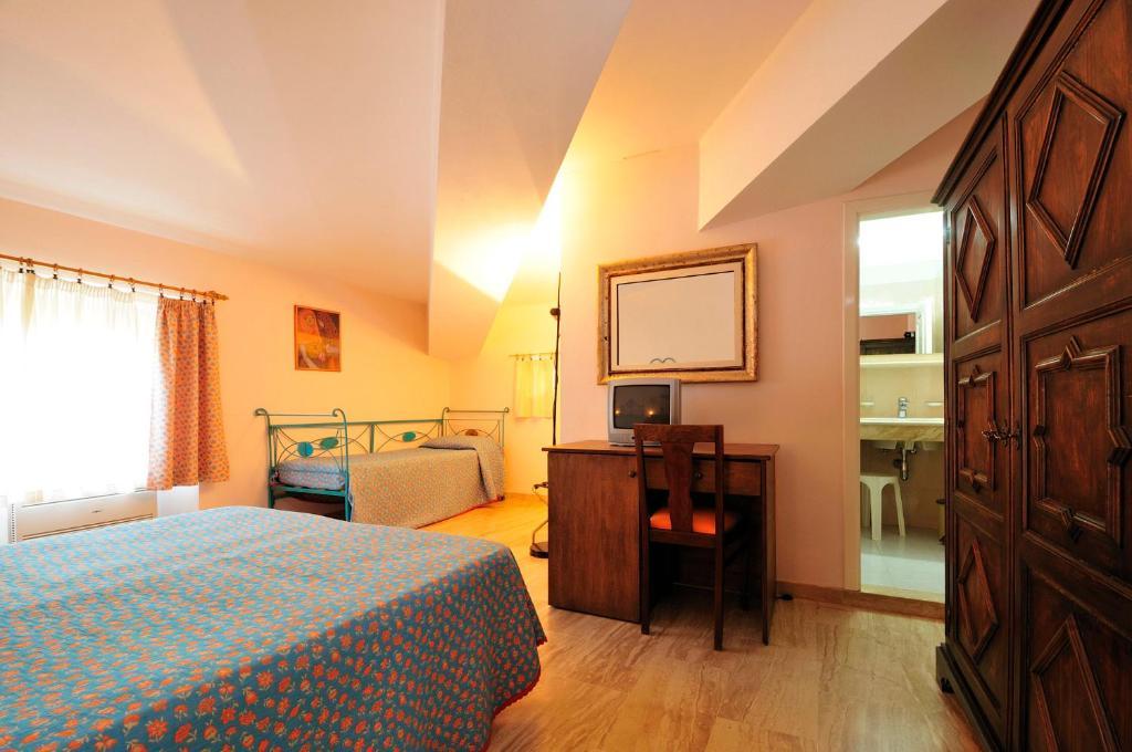 Hotel Villa Campana Cala Liberotto Room photo